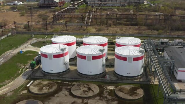 Liquid chemical tank terminal, Storage of liquid petrol fuel chemical and petrochemical product tank, Aerial view crude oil and gas terminal port, chemical industry factory.