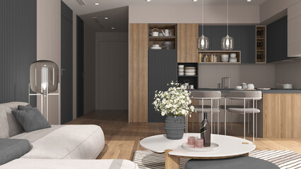 Cozy gray and wooden living room and kitchen in modern apartment, velvet sofa with table, kitchen with island and dining table, chairs. Carpet and appliances, interior design idea