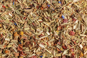 Alpine meadow herbal tea texture background. Mix tea with dried fruits and dried flowers. Tea...