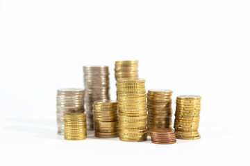 stacks of coins isolated in white