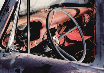 Old pickup truck steering wheel and dashboard