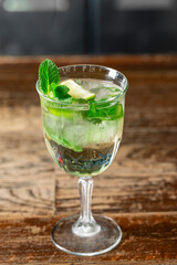 Mojito or virgin mojito long rum drink with fresh mint, lime juice, cane sugar and soda.
