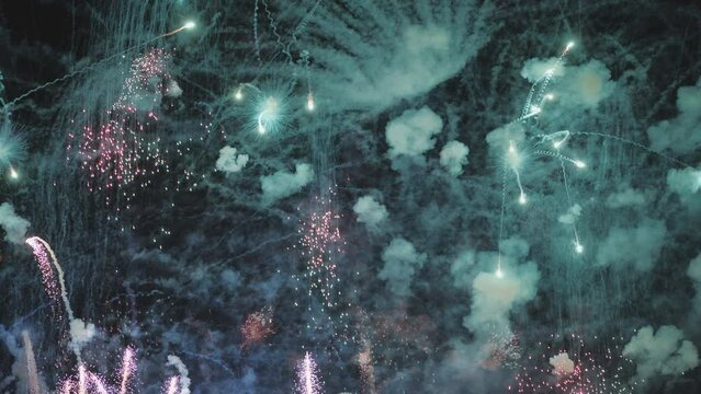 Beautiful fireworks at night over the city.