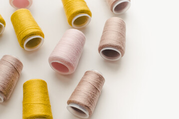 Spools of thread on a white background. Colored threads. 