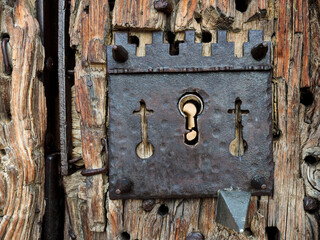 Antique door lock in the Pedraza castle. Segovia. Spain.