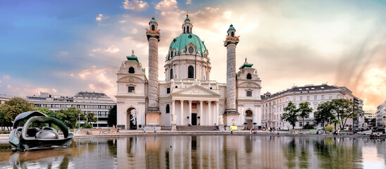 Fototapeta na wymiar Karlskirche ( St. Charles church) with pond in beautiful summer light, Vienna, Austria