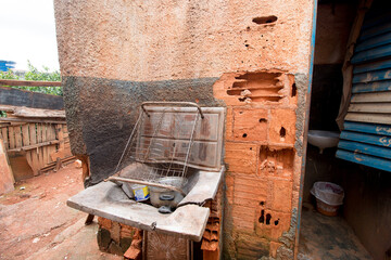 An Crudely Built  Bathroom that is detached from the rest of the house which is common in Brazil.