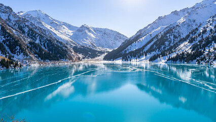 Turquoise color of mountain lake ice