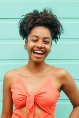 Positive young african woman, looking at camera black lives matter concept.