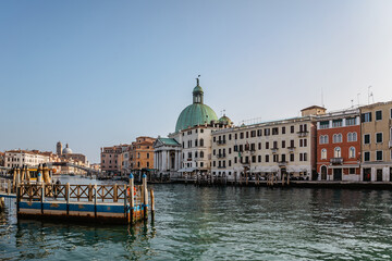 Grand Canal,Venice,Italy.Typical boat transportation.View of vaporetto station,Venetian public...