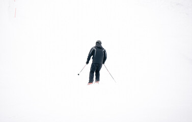 skiing in the mountains