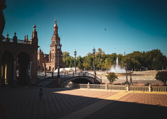 Naklejka premium Seville, Spain: 03-07-2021: Seville Sevilla Plaza de Espana in Andalusia Spain square. is a square in the Parque de Maria Luisa, Historical landmark. Arabic ceramic style. 