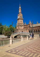 Seville, Spain: 03-07-2021: Seville Sevilla Plaza de Espana in Andalusia Spain square. is a square in the Parque de Maria Luisa, Historical landmark. Arabic ceramic style. 