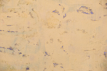 Old wall texture with cracked peeling paint. Abstract grunge backdrop