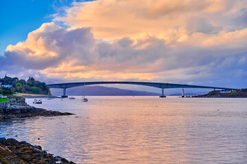 Fototapeta premium bridge over the river at sunset