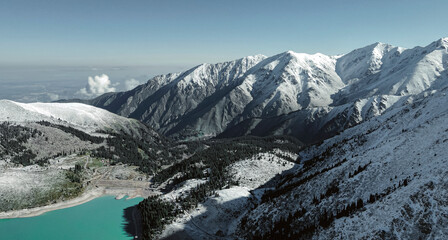 Obraz na płótnie Canvas Outdoor tourism in the snowy mountains. Tourism season in Kazakhstan. Nature textured