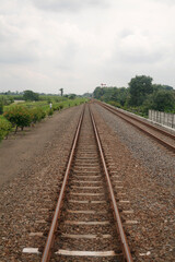 Fototapeta na wymiar railroad tracks in the countryside in java Indonesia
