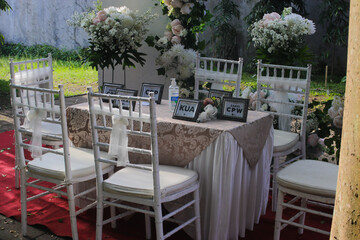 Wedding ceremony table with an outdoor wedding concept where the groom makes his wedding vows