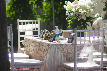 Wedding ceremony table with an outdoor wedding concept where the groom makes his wedding vows