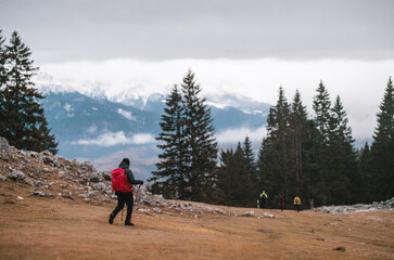 Mountaineers who seek out the snowy mountain peaks go with backpacks, a tent, and camera equipment to capture their experience