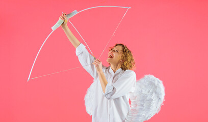 Female angel with bow and arrow. Valentines day cupid with white wings. Arrows of love.