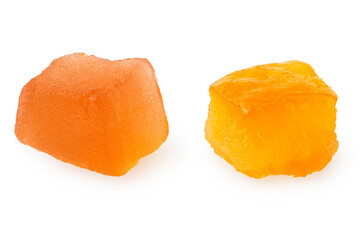 Two pieces of glazed dried fruit isolated.