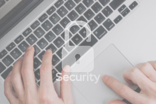 Hack security data protection. Computer Internet safe symbol on blured keyboard background. Business, technology, internet and networking security concept.