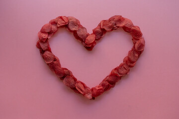 Valentine's day heart frame made with rose petals