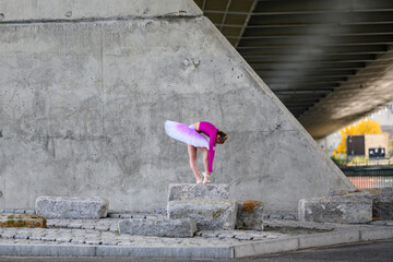 Graceful Urban Ballerina leaned over 