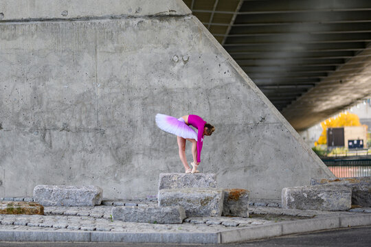 Graceful Urban Ballerina leaned over 