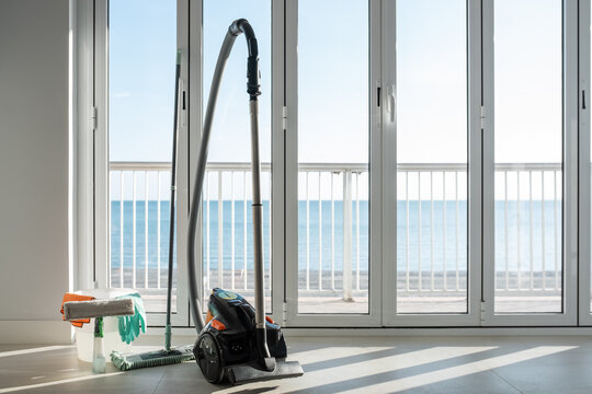 Cleaning supplies against balcony window