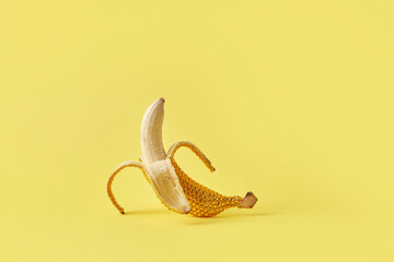 Peeled banana with shiny gemstones