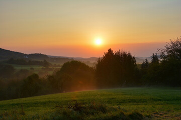 Sun rise over a landscape in Bavaria, Germany