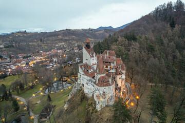 Fototapeta na wymiar Bran Castle, medieval historic landmark in Transylvania, Romania. History of Dracula myth attraction full of mystical