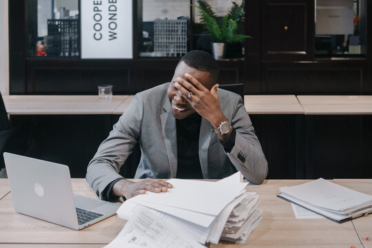 Man with black skin color at work in the office