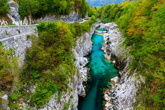 the crystalclear Water of River Soča cutes deep into Limestonerocks, autumn in Kobarid, Slovenia
