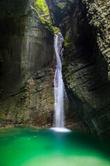 Kozjak-Waterfall, water splashing in a emerald green pond, Kobarid, Slovenia