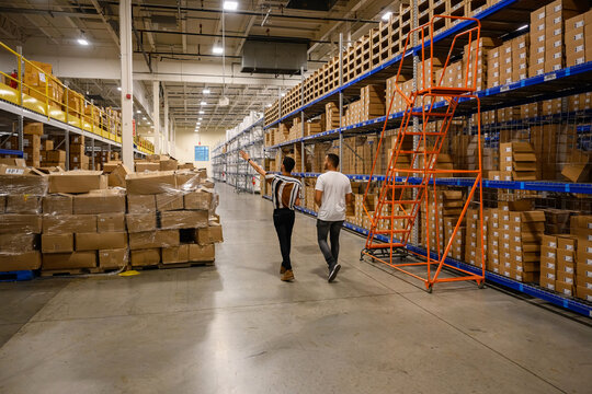 Freight warehouse with workers in meeting 