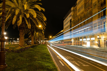 Long exposure photography of moving cars in urban streets