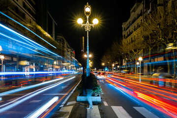 Fototapeta premium Long exposure photography of moving cars in urban streets
