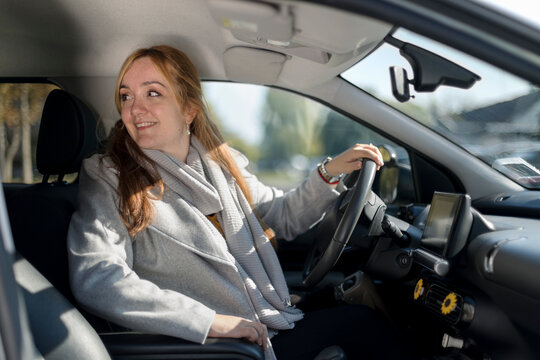 Woman with disability Driving a Car