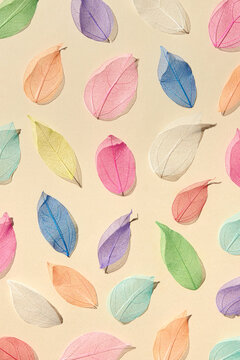 Seamless pattern of veined colorful leaves
