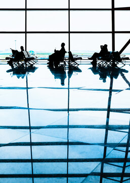 Tourist in airport waiting area. 
