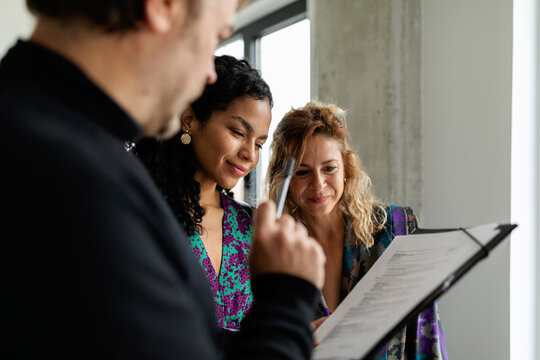 Mixed race women renting new flat