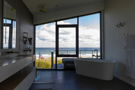 Oceanfront picture window in Home by the Beach
