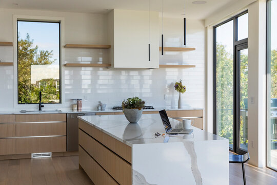 Computer on kitchen island with tile  