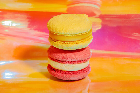 Bright macaroons on colorful background
