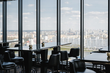 Contemporary restaurant interior with panoramic windows