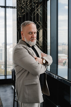 Confident mature businessman in office