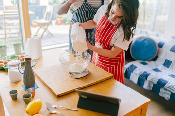 A couple Cooks Together at Home